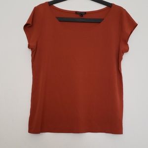 100% stretch silk tee in burnt orange